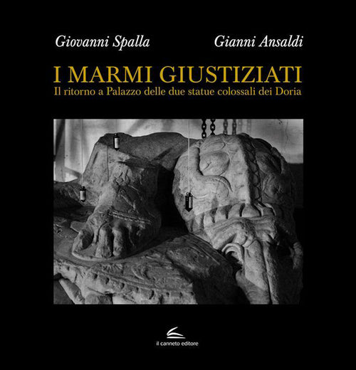 Cover of marmi giustiziati. Il ritorno a Palazzo delle due statue colossali dei Doria
