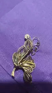 Spilla argento dorato in filigrana vintage