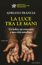 Cover of luce tra le mani. Un ladro, un convento e una città assediata