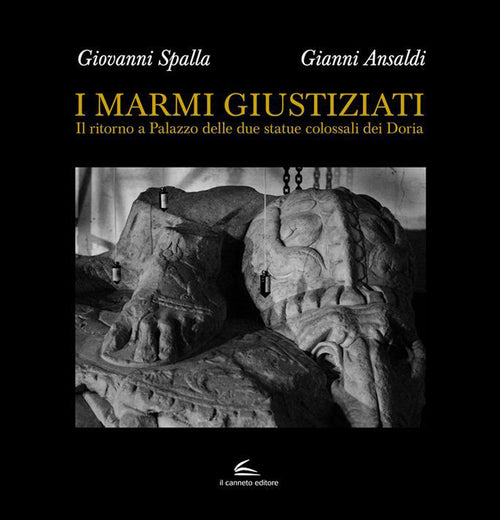 Cover of marmi giustiziati. Il ritorno a Palazzo delle due statue colossali dei Doria