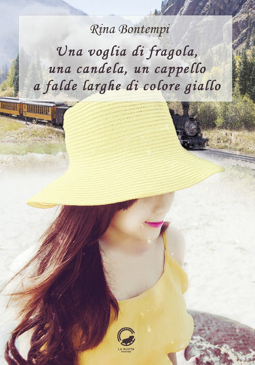 Cover of voglia di fragola, una candela, un cappello a falde larghe di colore giallo