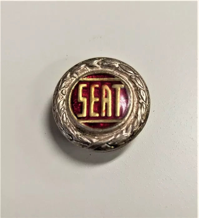 Audi badge. Club TR Spain badge. Seat cufflink.