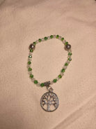 Bracciale con perline verdi e con charm Albero della Vita